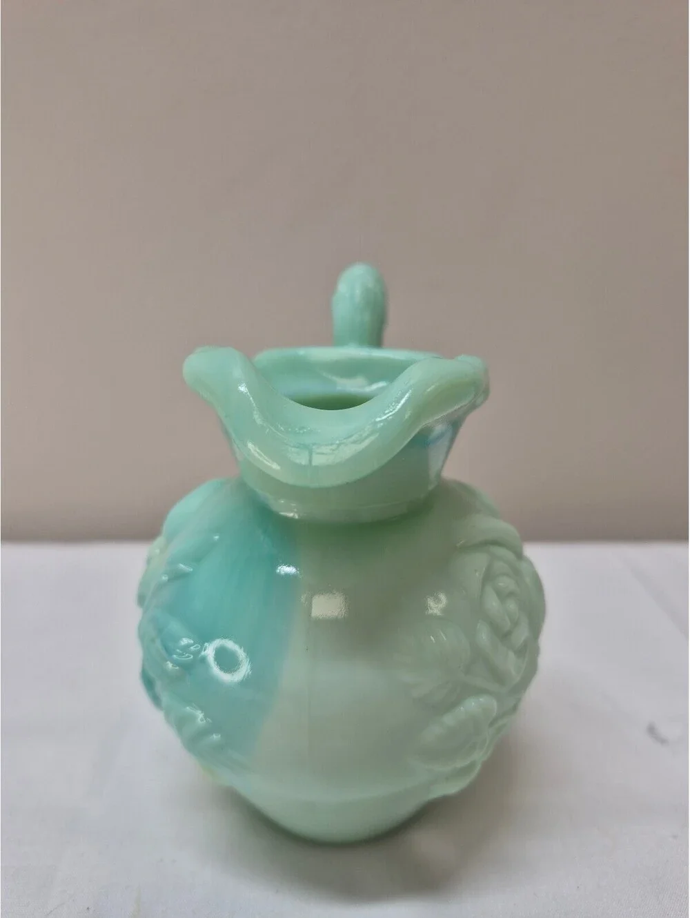 Vintage Avon Light Green Milk Glass Pitcher with Raised Floral Design J36
